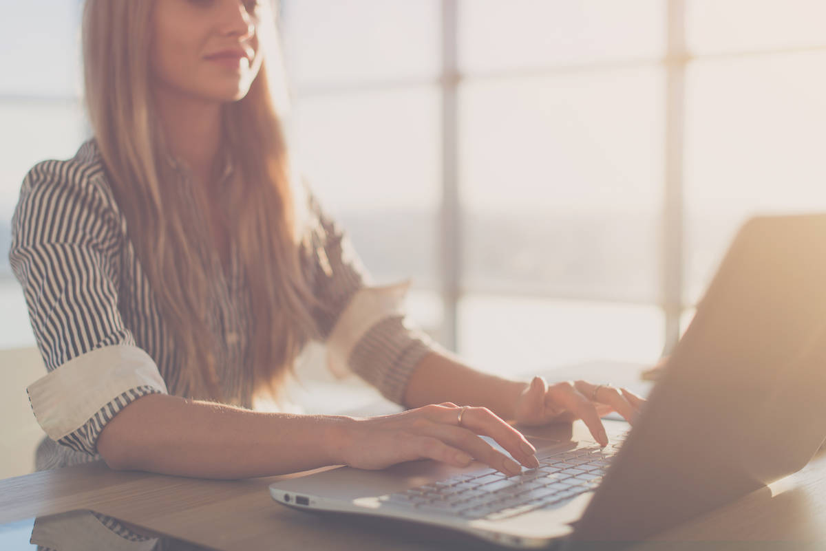 Female teacher at computer